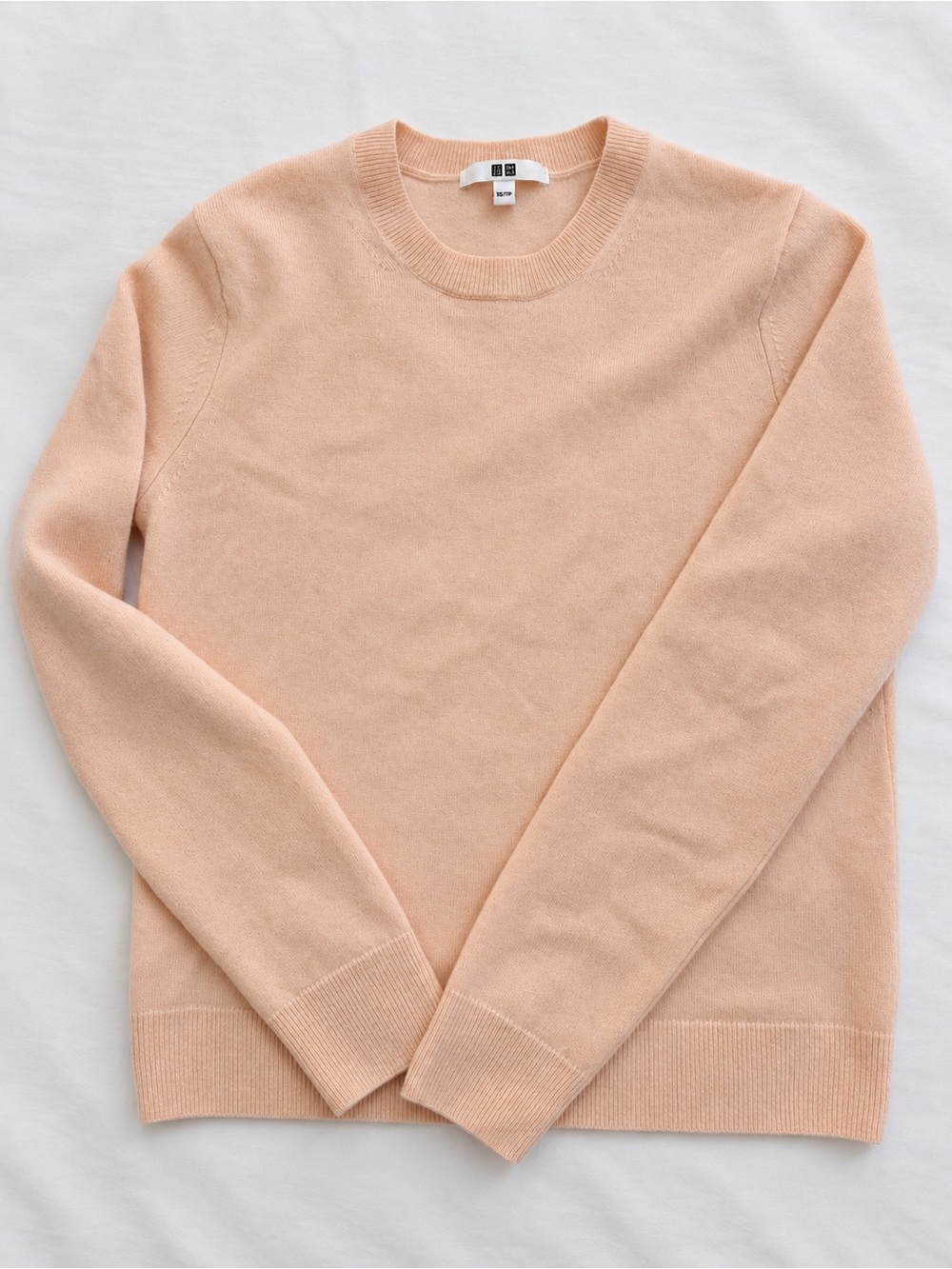 Uniqlo Women’s Cashmere Sweater in Peach/Pink